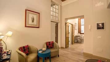 Deluxe Apartment | Living area | 30-inch LCD TV with digital channels