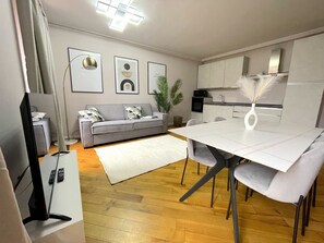 Panoramic Apartment | Living area | Flat-screen TV, fireplace - Best View Boutique Apartments  (Bergamo)
