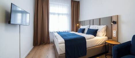 Camera con letto matrimoniale o 2 letti singoli | 1 camera, una cassaforte in camera, Wi-Fi gratuito