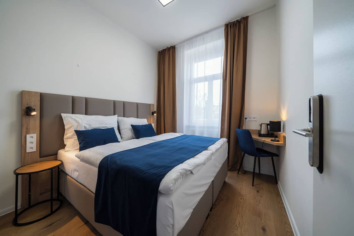 Kamar Double, kamar mandi umum | 1 kamar tidur, brankas, dan Wi-Fi gratis