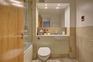Hair dryer, towels, soap, shampoo
