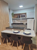 Apartamento | Cozinha privada | Geladeira, micro-ondas, liquidificador