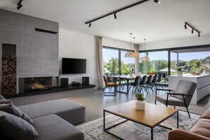 TV, fireplace, DVD player, foosball