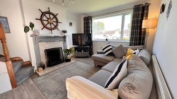 House | Living area | TV, fireplace