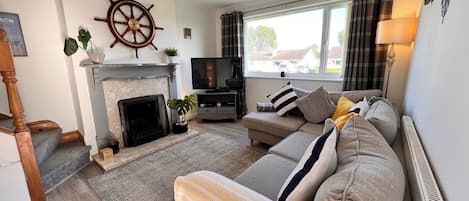 House | Living area | TV, fireplace