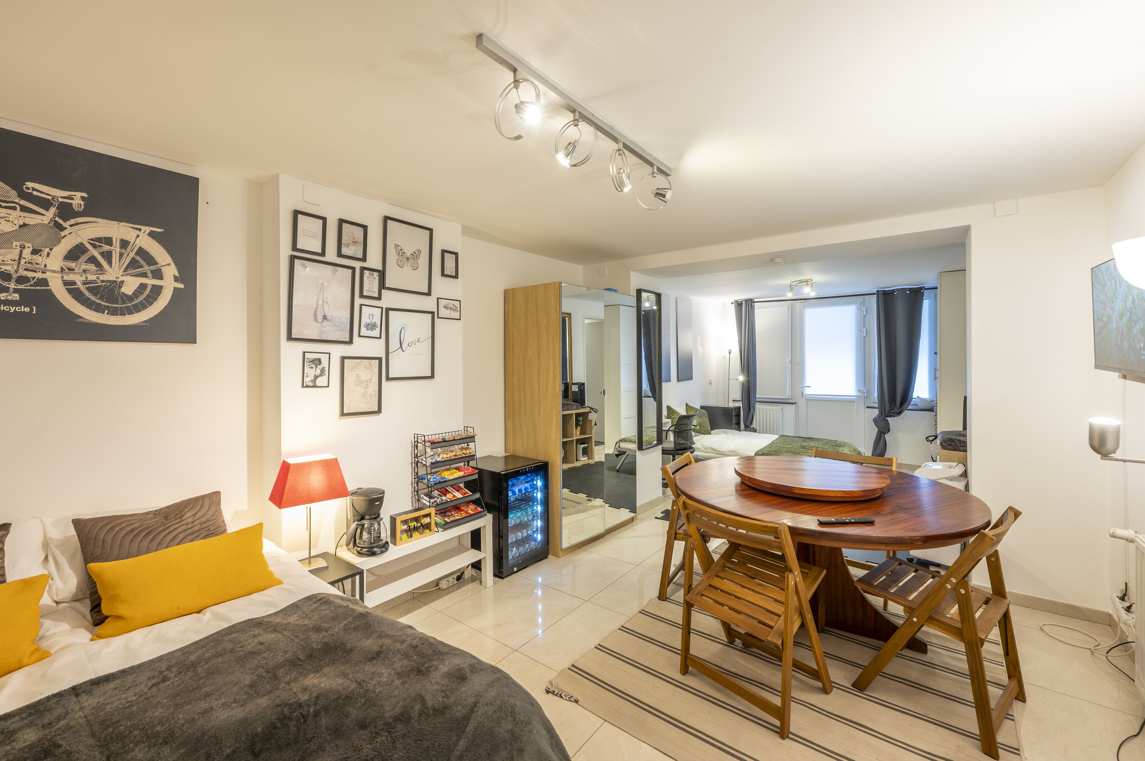 1 bedroom, desk, iron/ironing board, travel crib