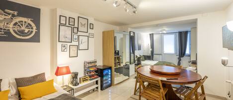 1 bedroom, desk, iron/ironing board, travel crib