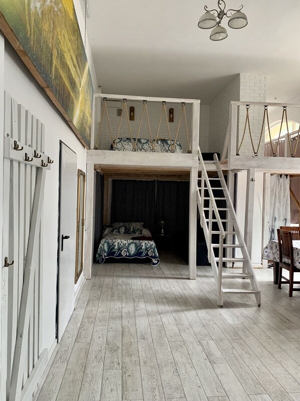 1 bedroom, desk, iron/ironing board, travel crib