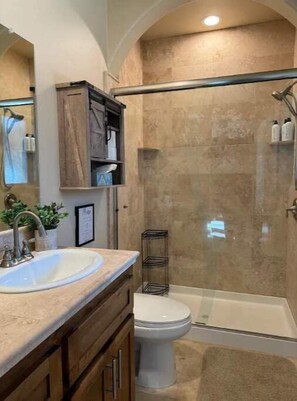 Shower, hair dryer, towels, soap