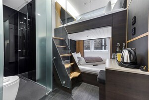 Family Room | Desk, laptop workspace, blackout drapes, soundproofing