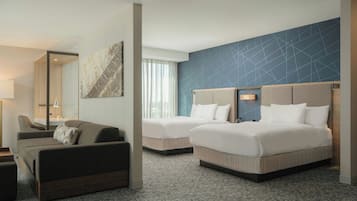 Desk, blackout drapes, iron/ironing board, free cribs/infant beds