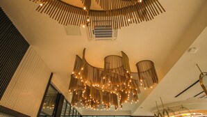 A modern interior with a circular ceiling design and large windows. - GÖRGÜLÜ HOTEL (Kesan)