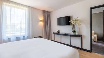 Suite, 1 kingsize bed | Individueel gemeubileerd, een bureau, verduisterende gordijnen