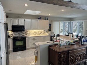 Fridge, microwave, dishwasher, coffee/tea maker