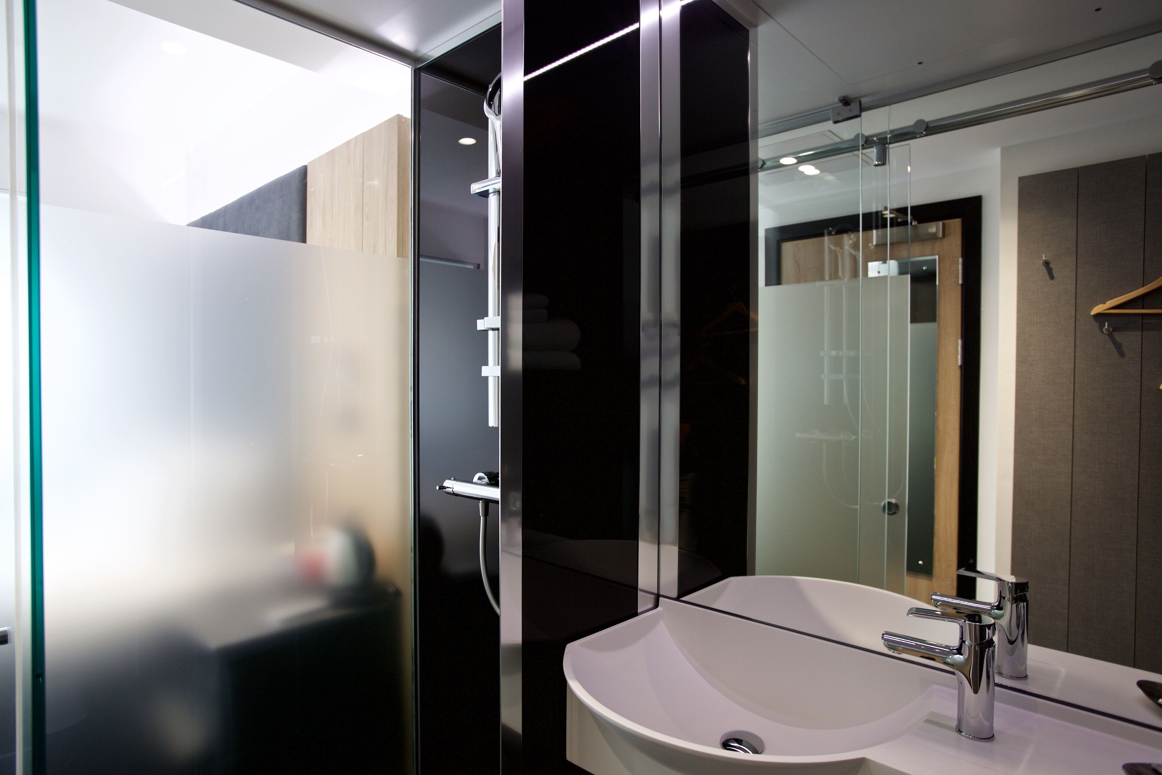 Double Room, No Windows | Bathroom | Shower, towels, soap, shampoo