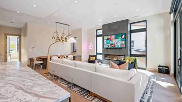 Superior Townhome | Living area | Fireplace, heated floors
