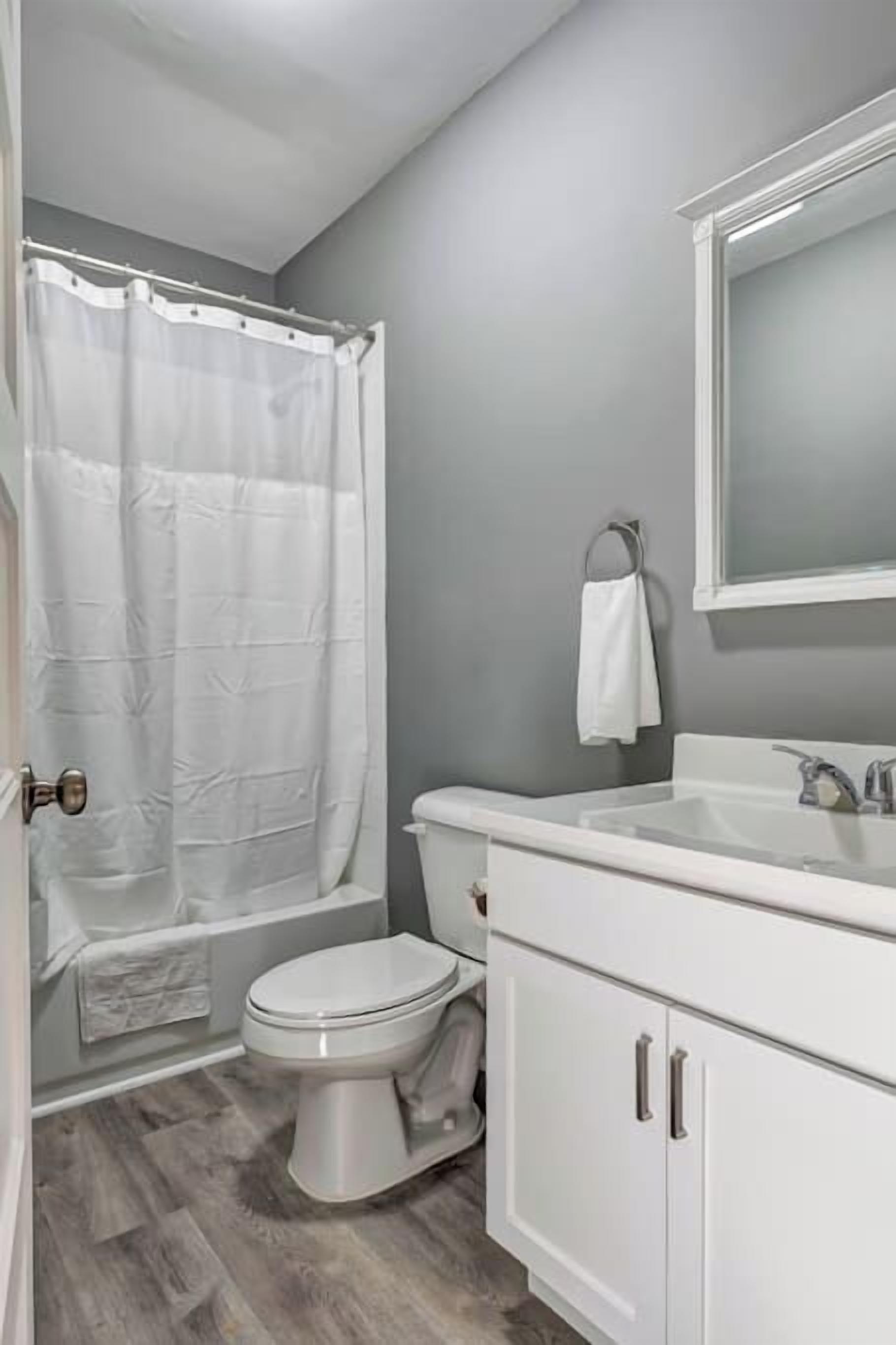 Shower, hair dryer, towels, shampoo
