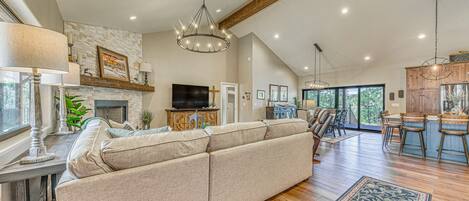 TV, fireplace, books