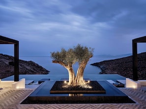 Indoor pool, seasonal outdoor pool, pool umbrellas, pool loungers