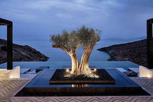 Indoor pool, seasonal outdoor pool, pool umbrellas, sun loungers