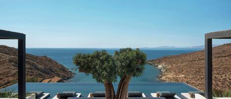 Indoor pool, seasonal outdoor pool, pool umbrellas, pool loungers