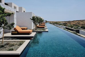 Indoor pool, seasonal outdoor pool, pool umbrellas, sun loungers
