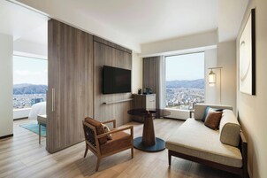 Suite, 1 King Bed, City View (1 Bedroom) | In-room safe, desk, free WiFi, bed sheets