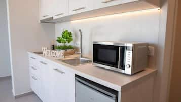 Luxury Apartment | Private kitchenette | Mini-fridge, microwave, stovetop, coffee/tea maker