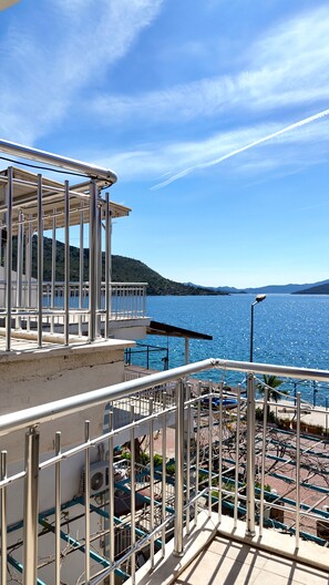 Standard Triple Room, Partial Sea View | Terrace/patio