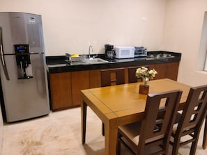 Fridge, microwave, coffee/tea maker, toaster