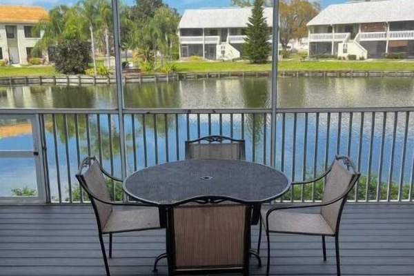 Screened in deck on the pond