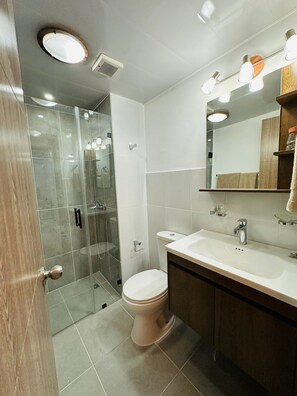 Shower, towels, soap, shampoo