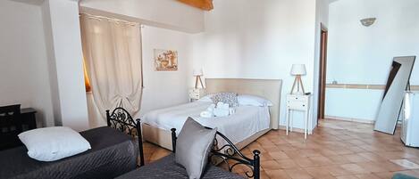 Minibar, desk, laptop workspace, blackout curtains