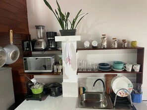 Fridge, stovetop, cookware/dishes/utensils