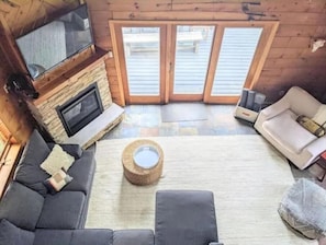 Smart TV, fireplace, books