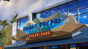 A building with a sign that reads "The Great White Shark Water Park."