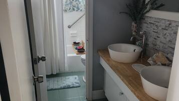 Hair dryer, towels, soap, shampoo
