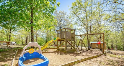 Welcome to our charming tiny house cabin at Blue Clouds Resort!