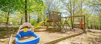 Welcome to our charming tiny house cabin at Blue Clouds Resort!