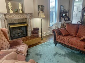 TV, fireplace, books