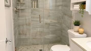 Hair dryer, towels, soap, shampoo