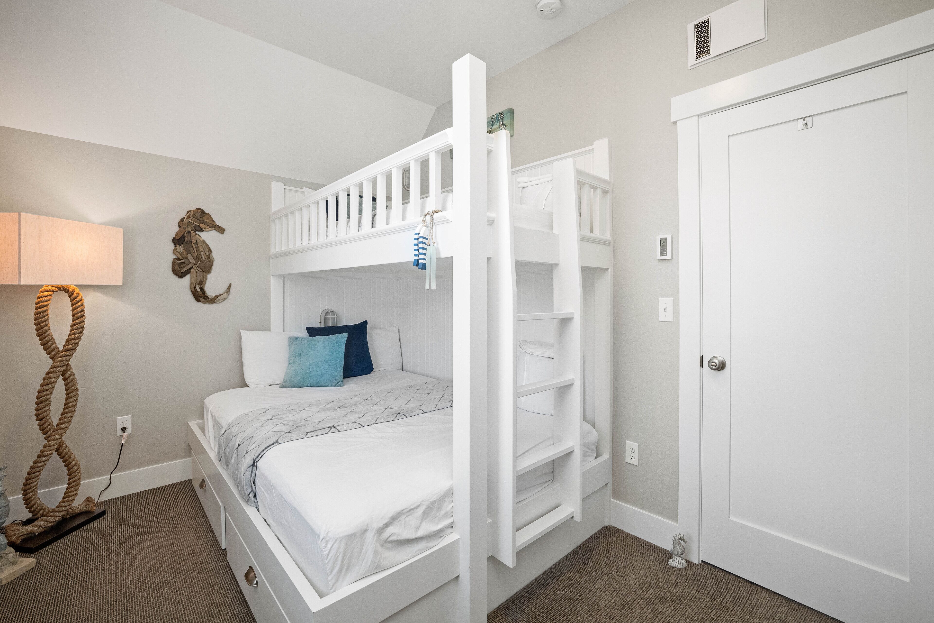 The second bedroom has a bunk bed with a twin top and double bottom. 