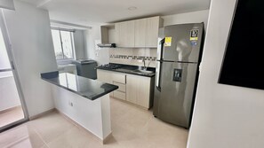 Apartment | Private kitchen | Fridge - La Magnifica by Olamar Living (Coveñas)