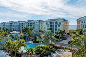 Outdoor pool, a heated pool - New Listing - Exquisite getaway in Harbour Isle Margaritaville. Pet friendly. (Bradenton)