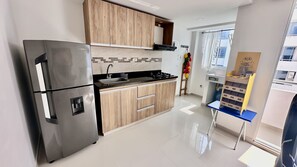 Apartamento | Cozinha privada | Geladeira