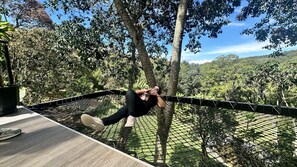 Luxury Cabin, Lake View | Living area | 55-inch flat-screen TV with premium channels, TV - Guadalajara Glamping (Moniquirá)