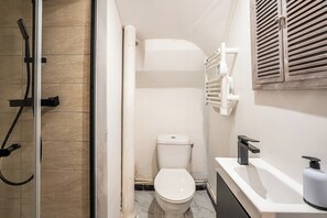 Hair dryer, towels, soap, toilet paper