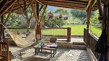 Superior Bungalow | Living area. Pradera Ecoliving