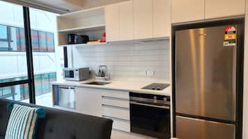 Appartement Ville | Coin séjour | Télévision LED de 50 pouces avec chaßnes par satellite
