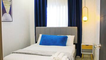 2 habitaciones, tabla de planchar con plancha y wifi gratis